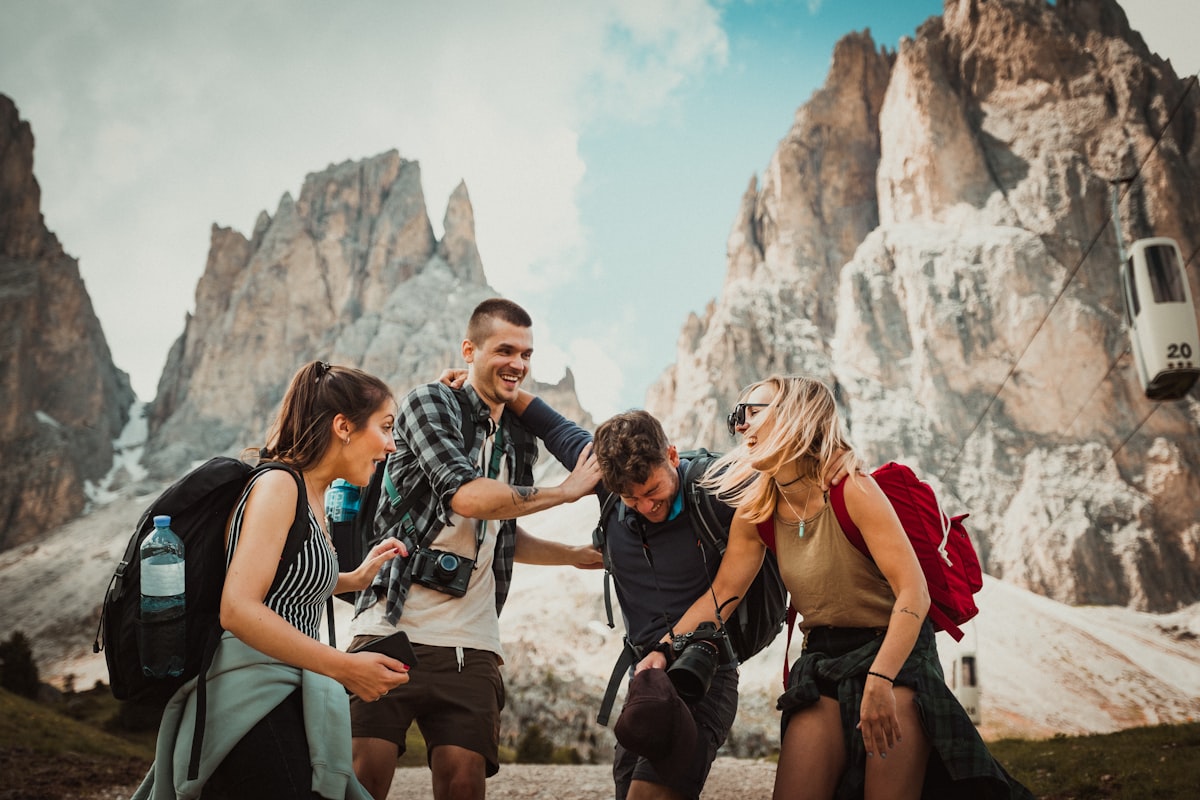 Group of friends hiking a mountain trail together